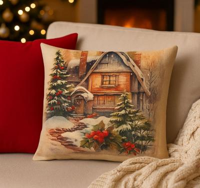 диван с коледна възглавница с къщичка в снежна гора