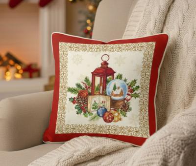възглавничка с коледна калъфка върху кресло