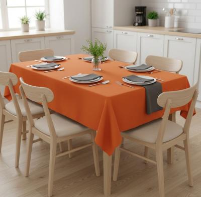 Оранжева покривка за маса, която пази топлината на лятото